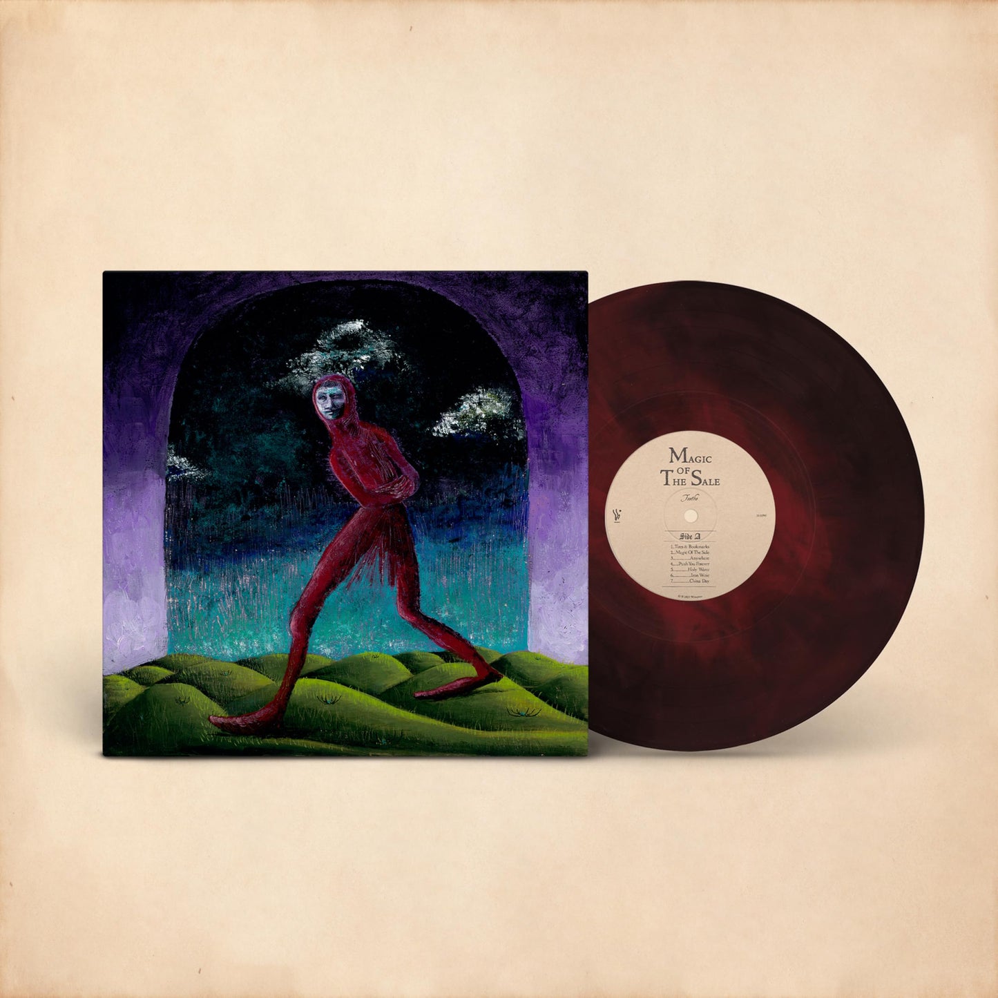 Purple vinyl record with cover art depicting a red figure in a landscape.