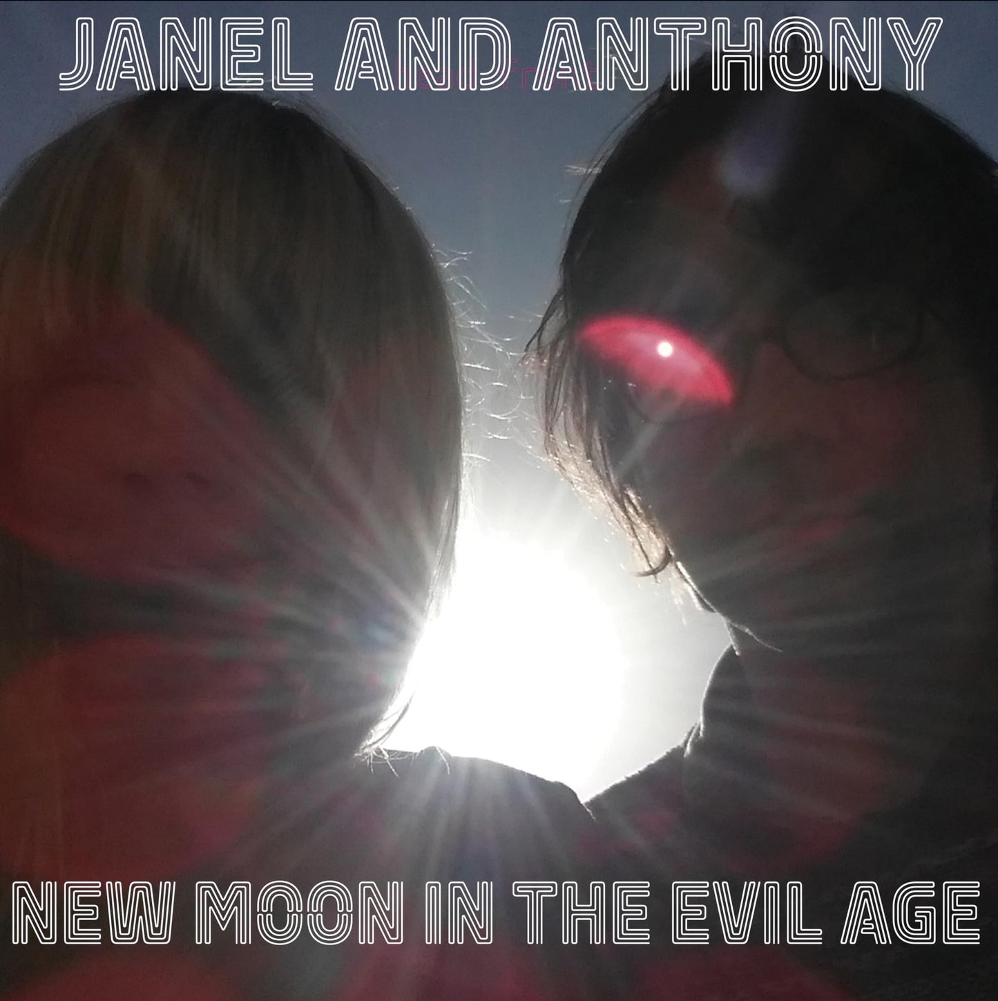 CD cover: two figures silhouetted against a bright, glowing moon.