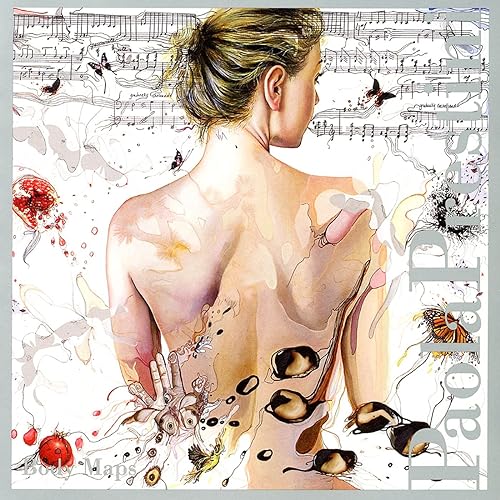 Woman’s back with anatomical drawings, birds, and musical notes.