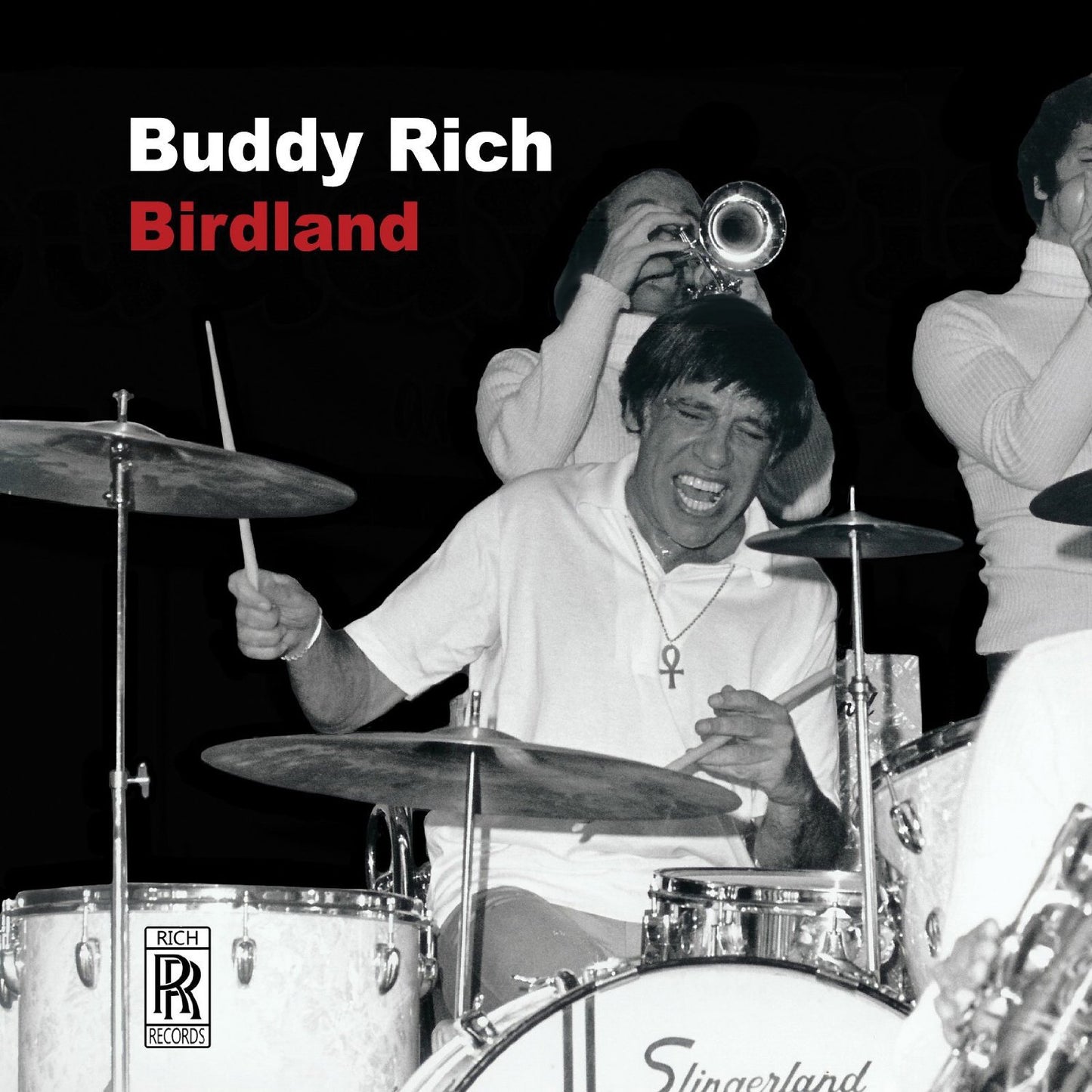 Buddy Rich playing drums with a band on the Birdland CD cover.