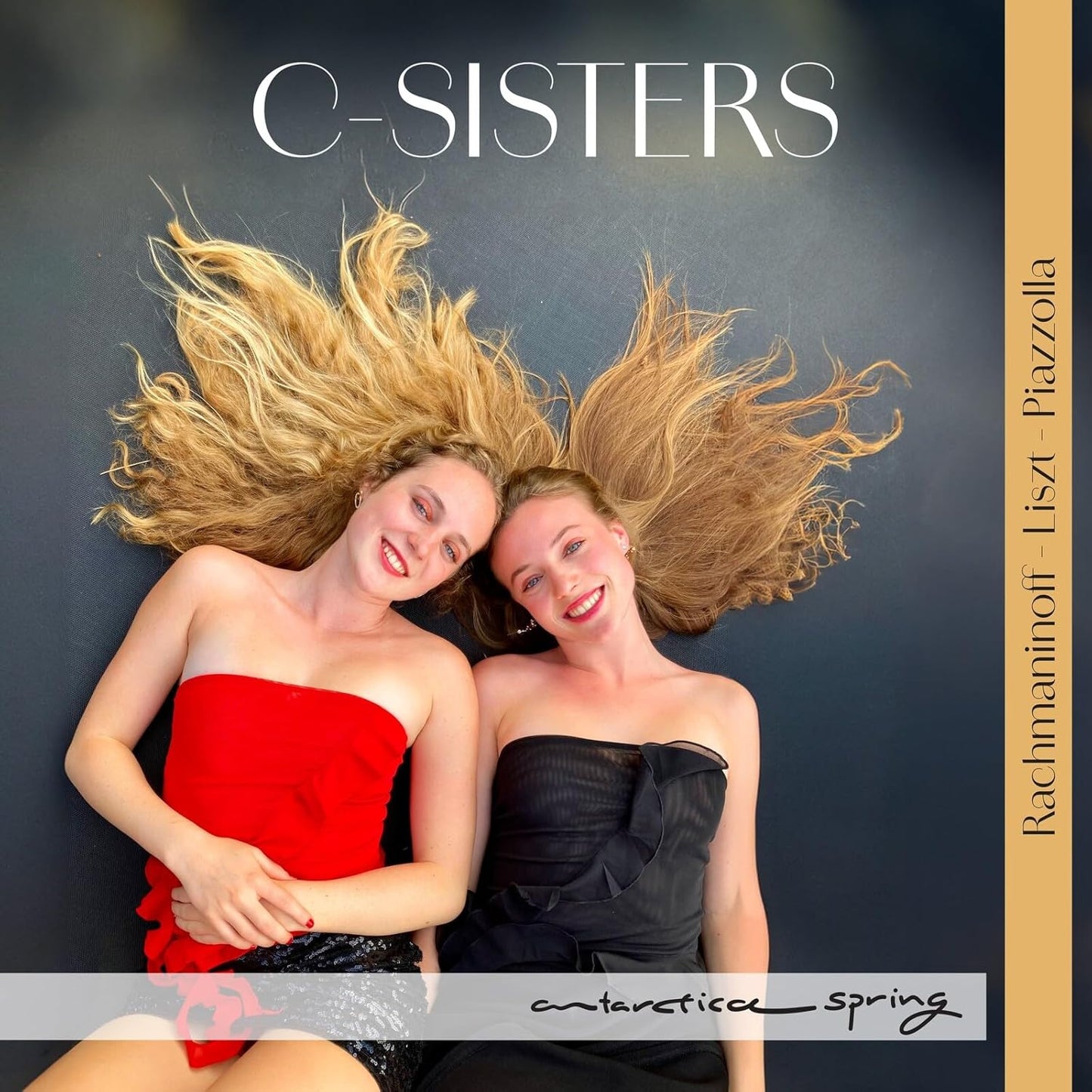 CD cover: two smiling women in red dresses, text “C-Sisters”.