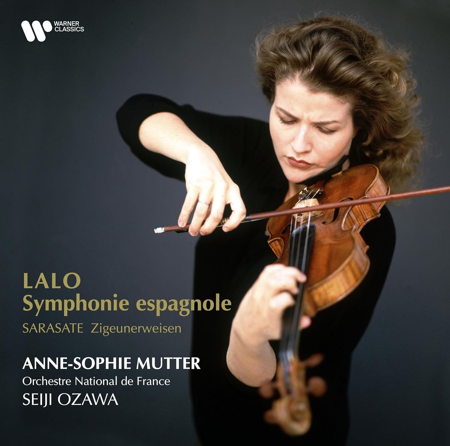 Anne-Sophie Mutter playing violin, album cover for Lalo’s Symphonie espagnole.