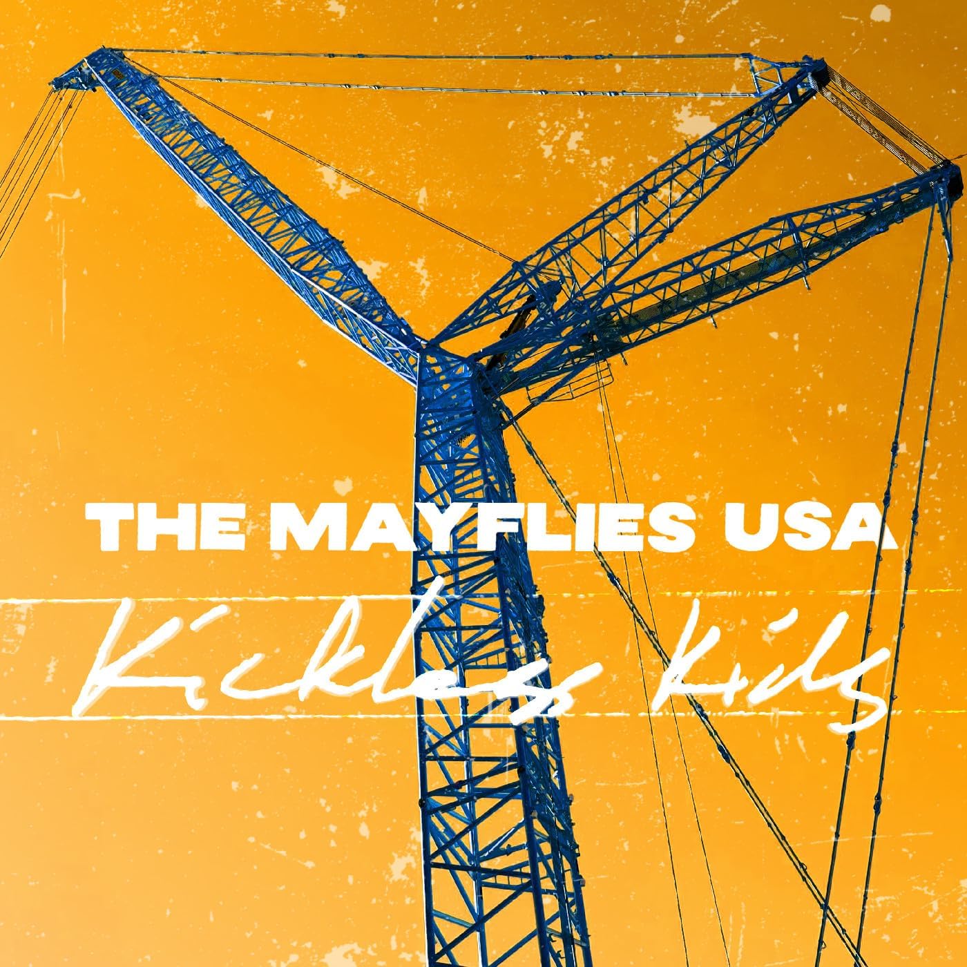 Peach vinyl record of Mayflies USA's "Kickless Kids" with barcode visible.