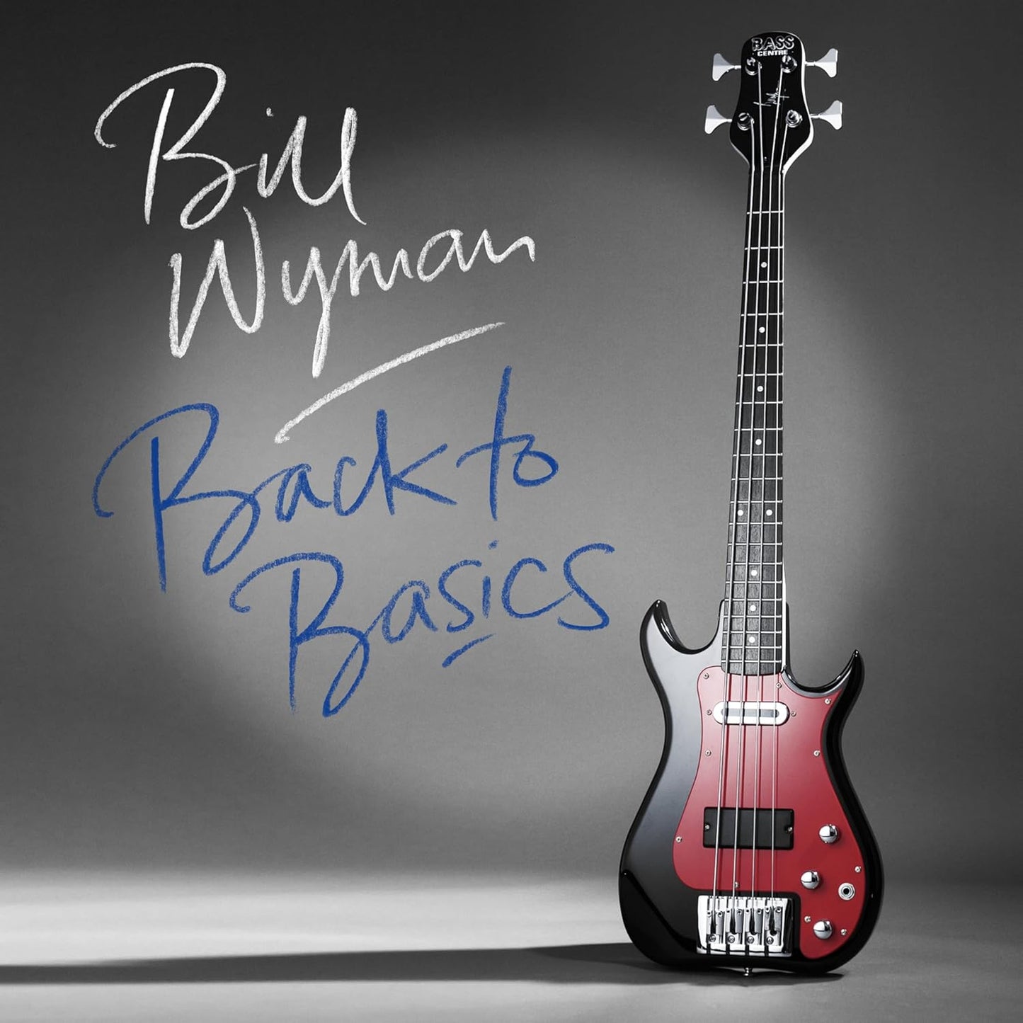 Album cover for Bill Wyman’s “Back To Basics” featuring a bass guitar.