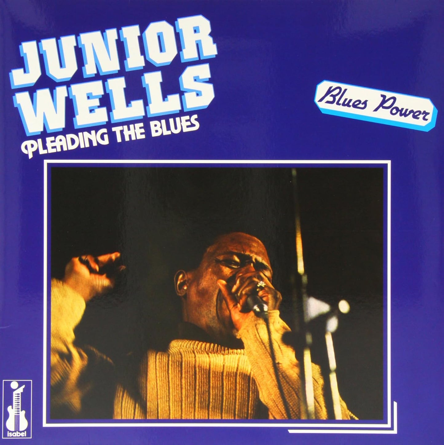 Junior Wells album cover: a blues musician playing a harmonica.