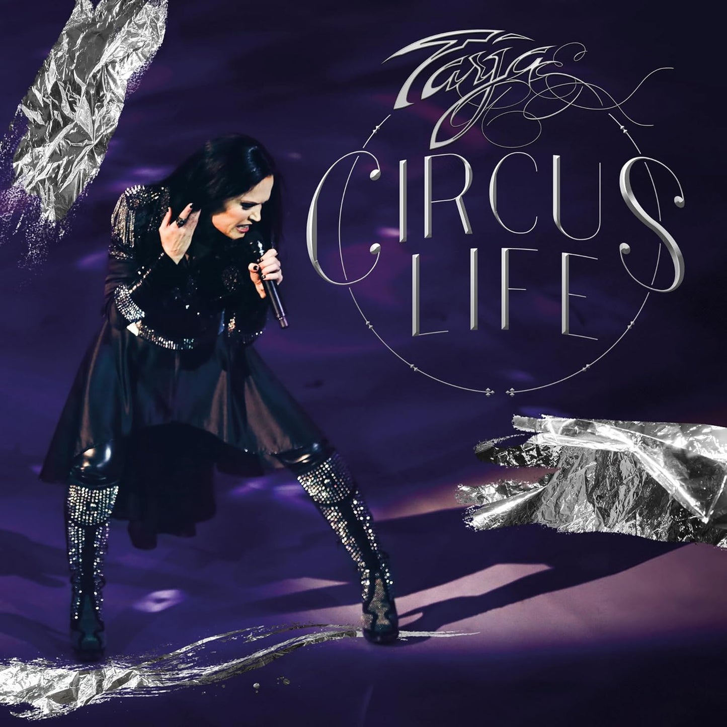 Tarja Turunen album cover: singer in black, silver accents, "Circus Life".
