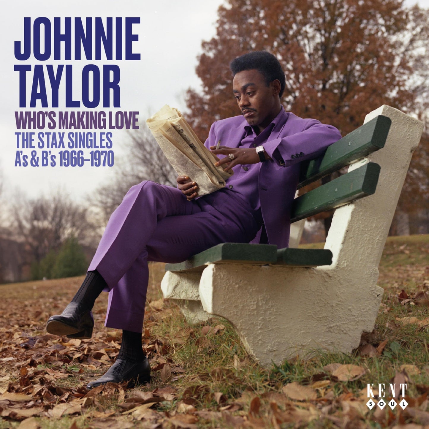 Johnnie Taylor album cover: portrait of singer in purple suit on a park bench.