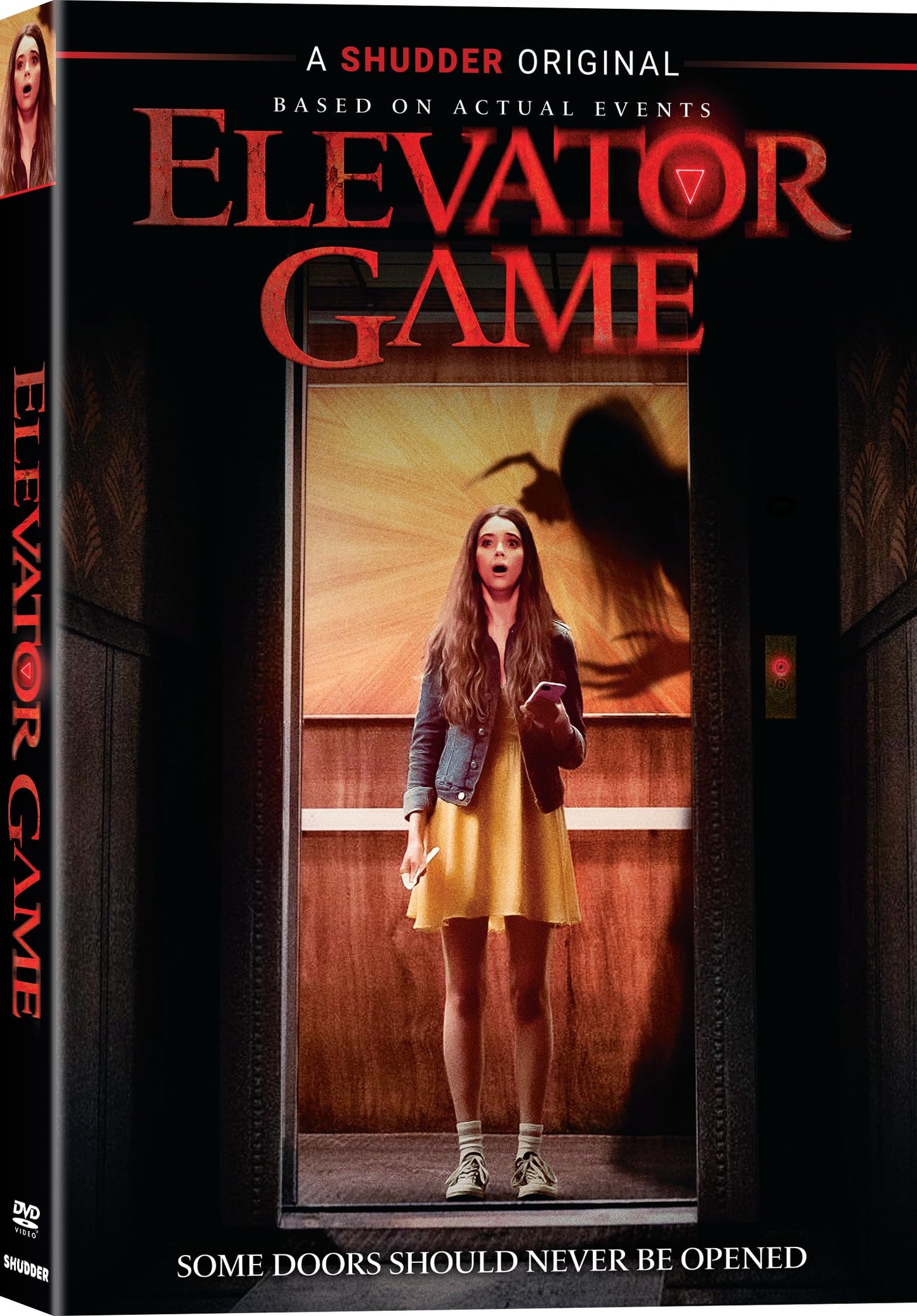 DVD cover for horror film "Elevator Game" featuring a girl in an elevator.