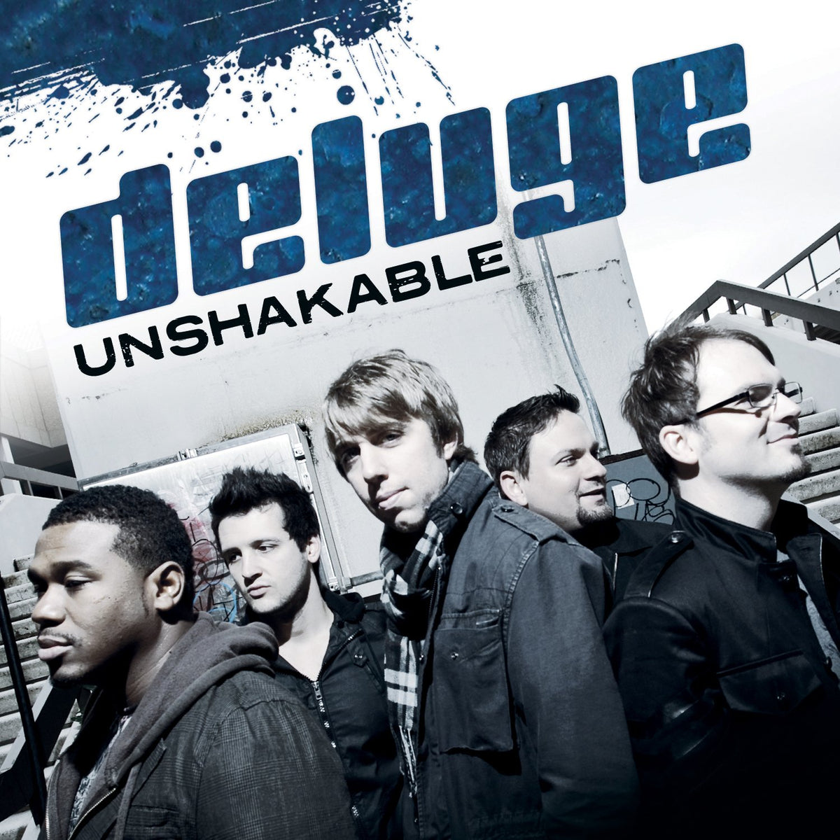 CD cover for “Unshakable” featuring a band of five young men.