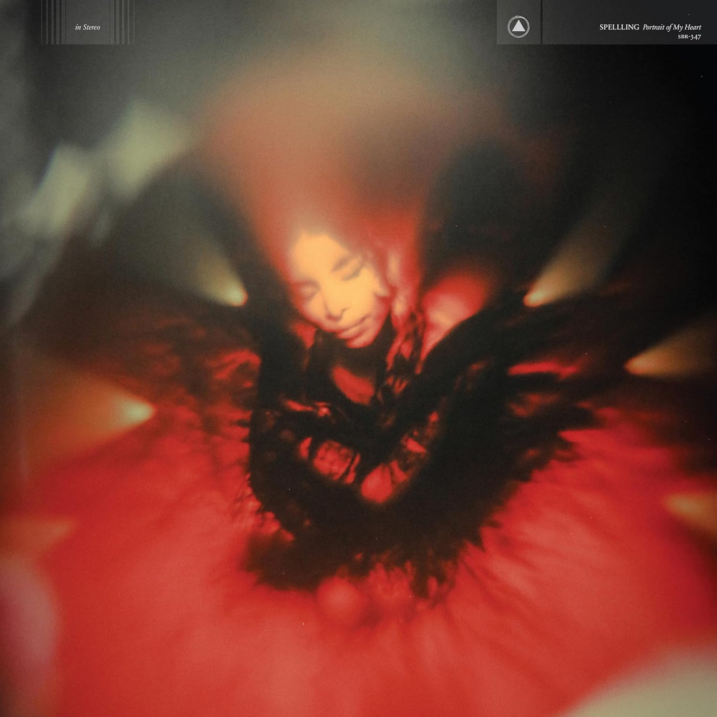 CD cover for Spelllingās āPortrait Of My Heartā featuring a blurred portrait.