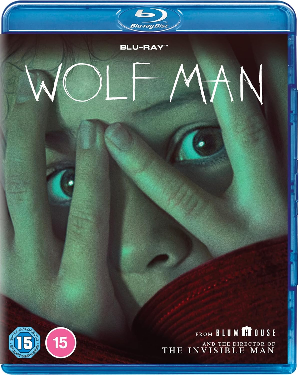 Blu-ray cover for Wolf Man featuring a person peering through their fingers.