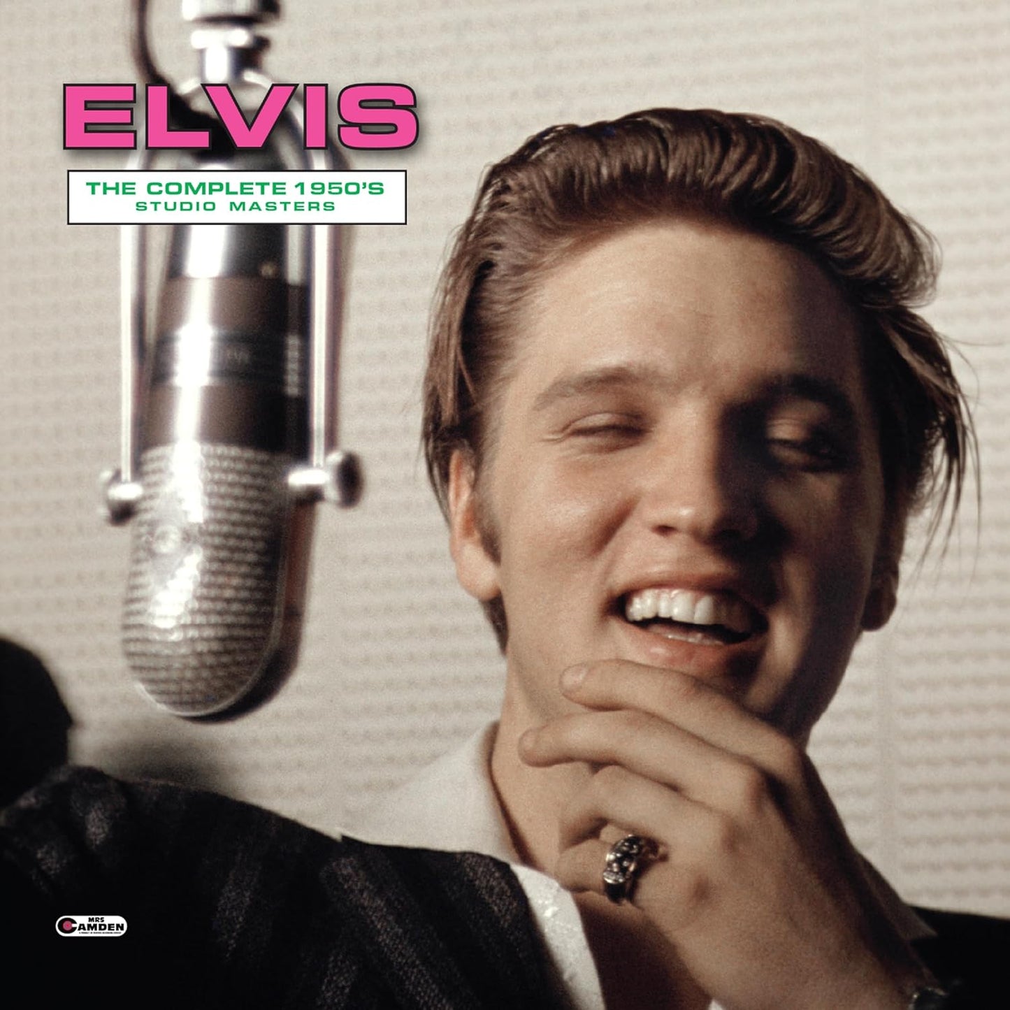 Elvis Presley singing into a vintage microphone, album cover.