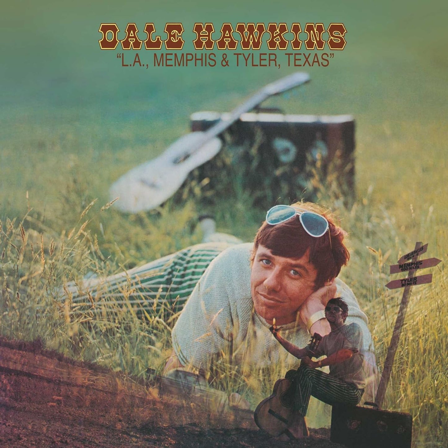 Dale Hawkins album cover featuring a man with a guitar and suitcase.