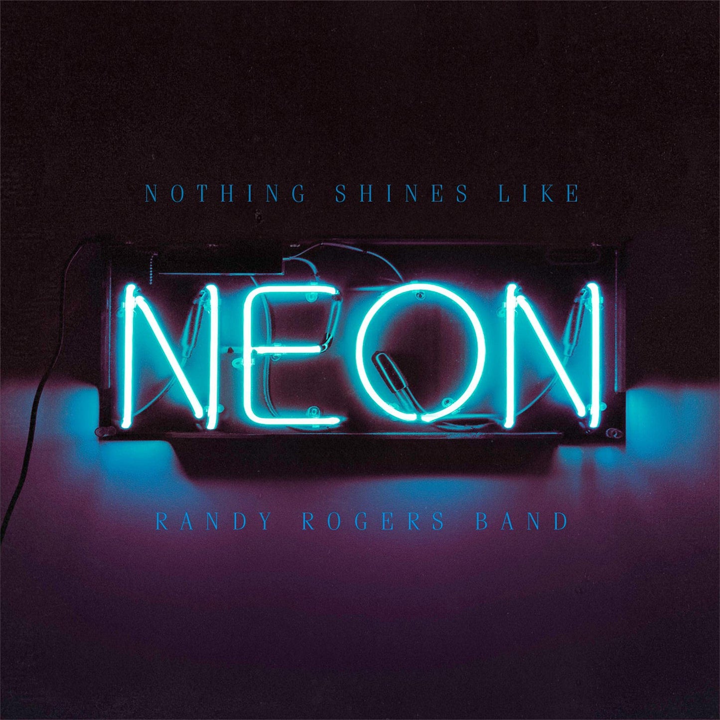 Album cover featuring a glowing neon sign spelling "NEON" in pink light.