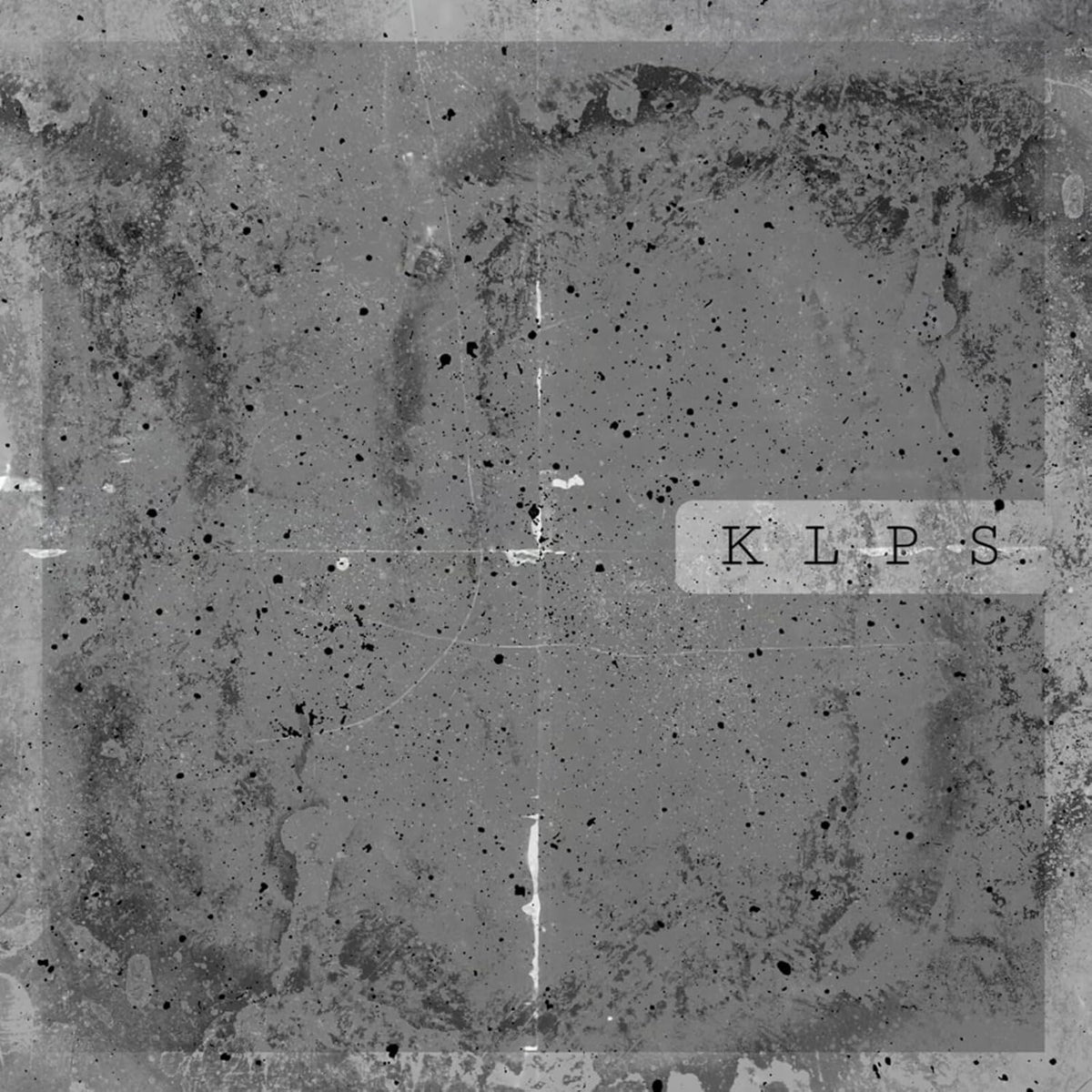 Gray, textured CD cover with the text “K L P S” in the lower right.