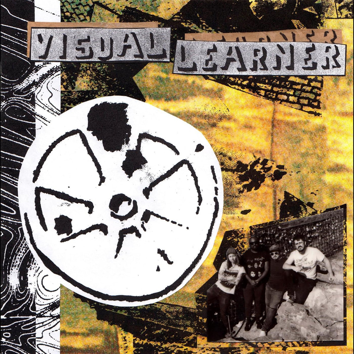 Vinyl record cover with black and white graphics, and a band photo.