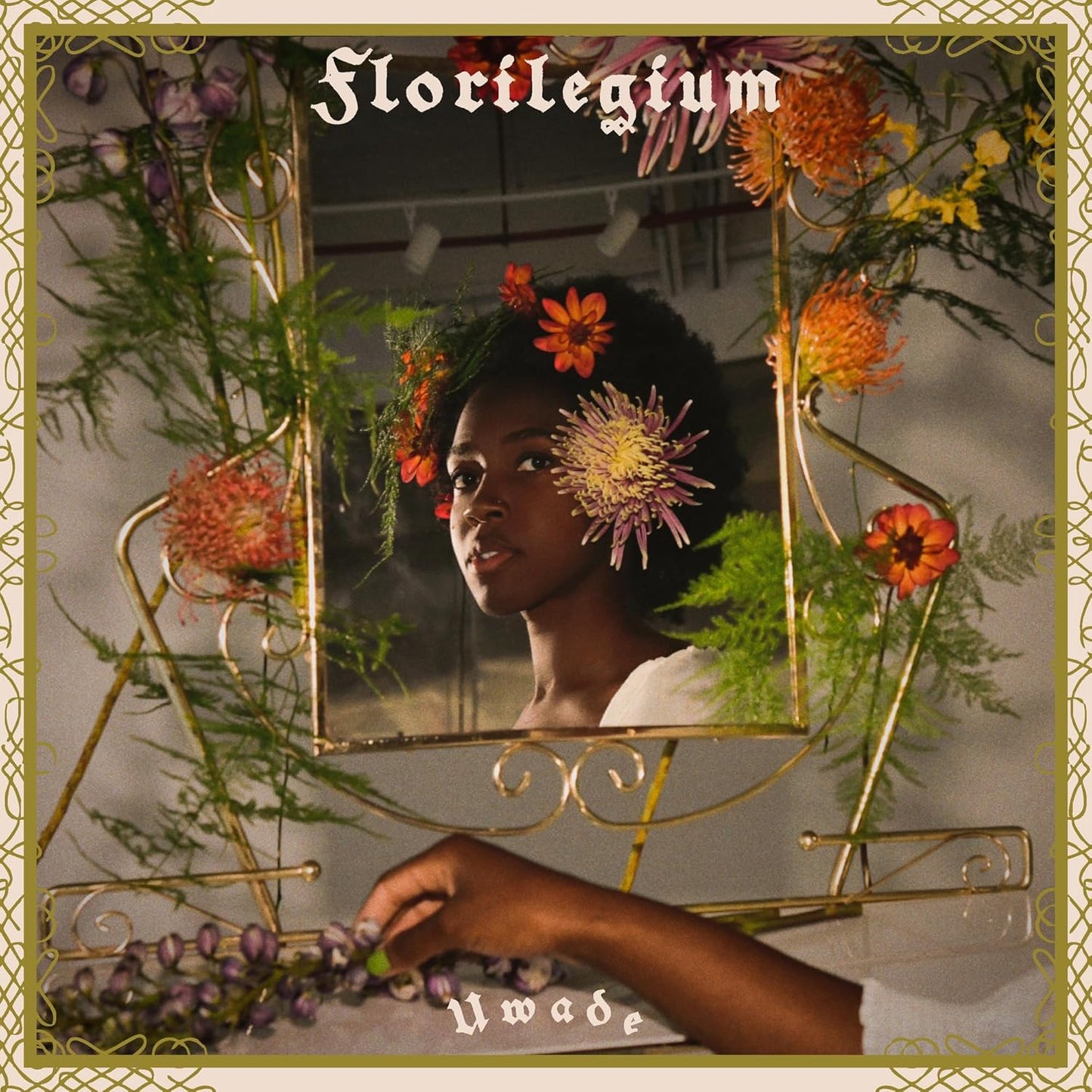 CD case for Uwade’s “Florilegium” album, featuring floral artwork.