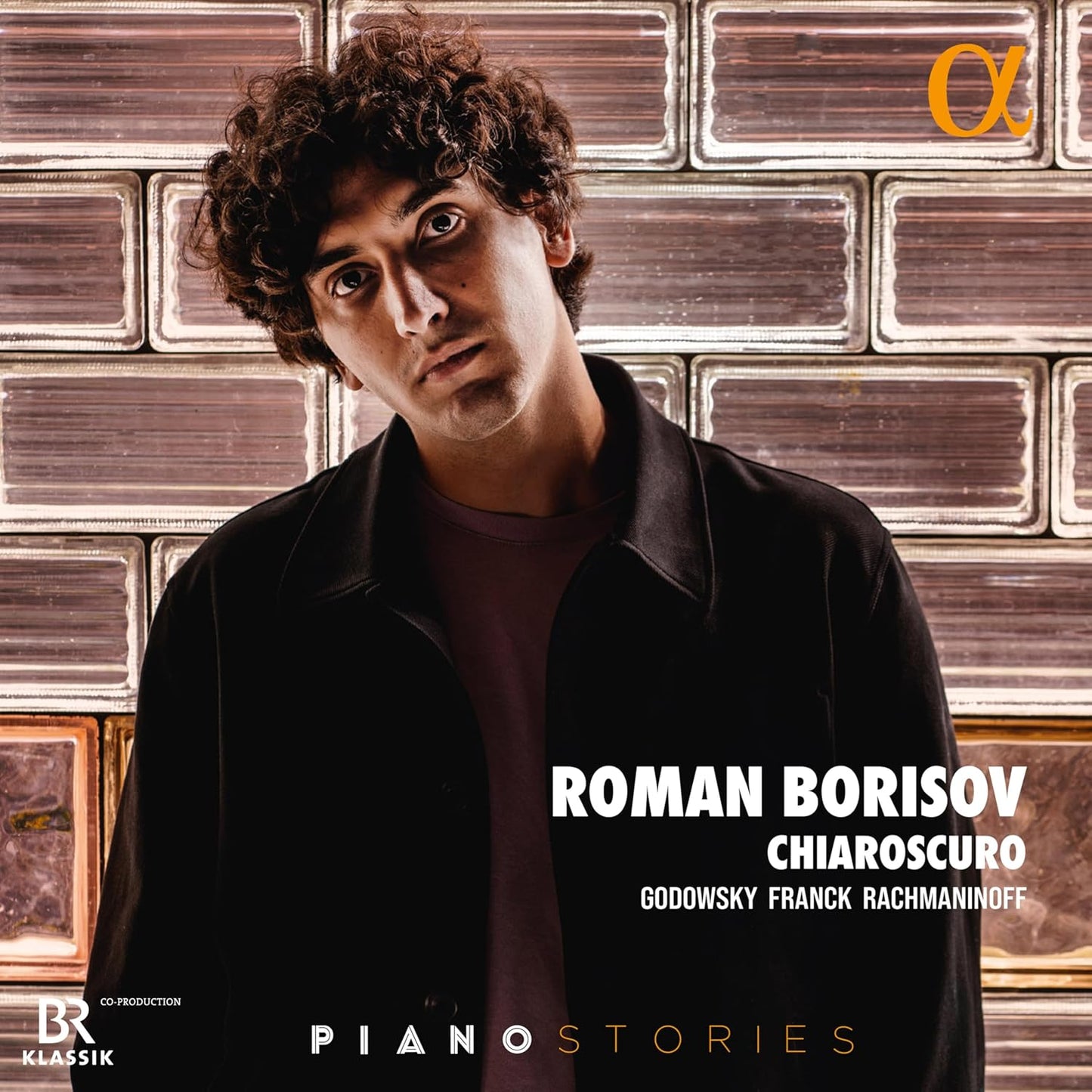 CD cover featuring pianist Roman Borisov in a dark jacket.