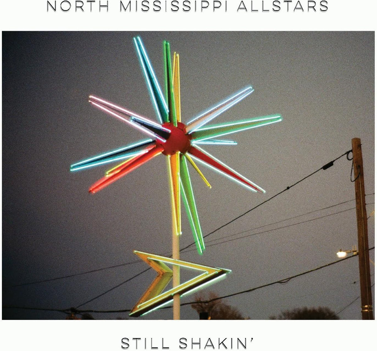 Album cover for North Mississippi Allstars’ “Still Shakin’” featuring a neon sign.