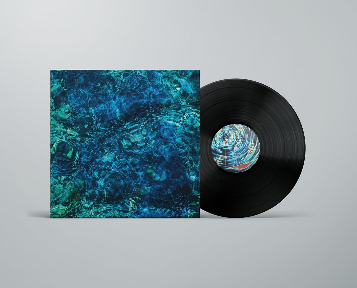 Vinyl record with blue, textured album cover and center label.
