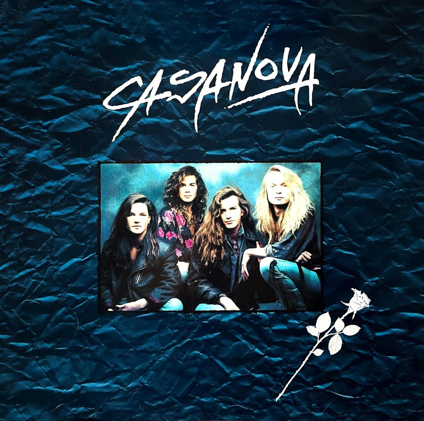 Casanova album cover featuring a band photo and a white rose.