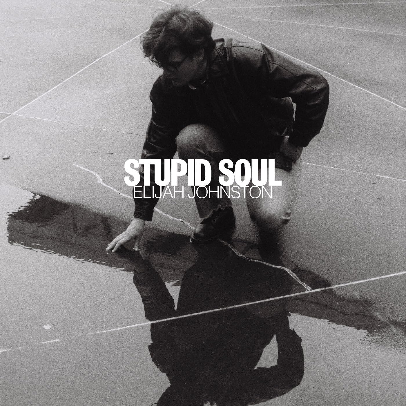 Black and white album cover featuring Elijah Johnston and the title “Stupid Soul.”