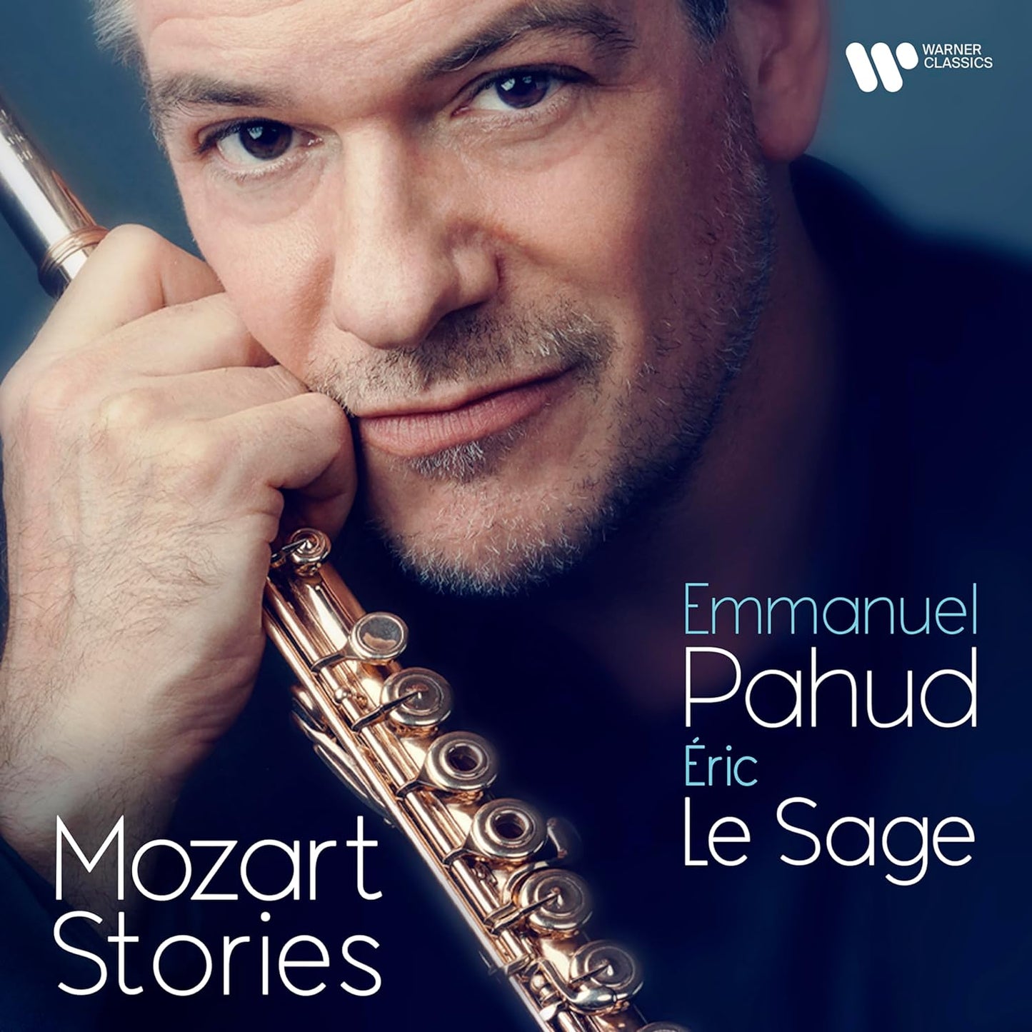 Close-up of flutist Emmanuel Pahud with a silver flute, album cover.