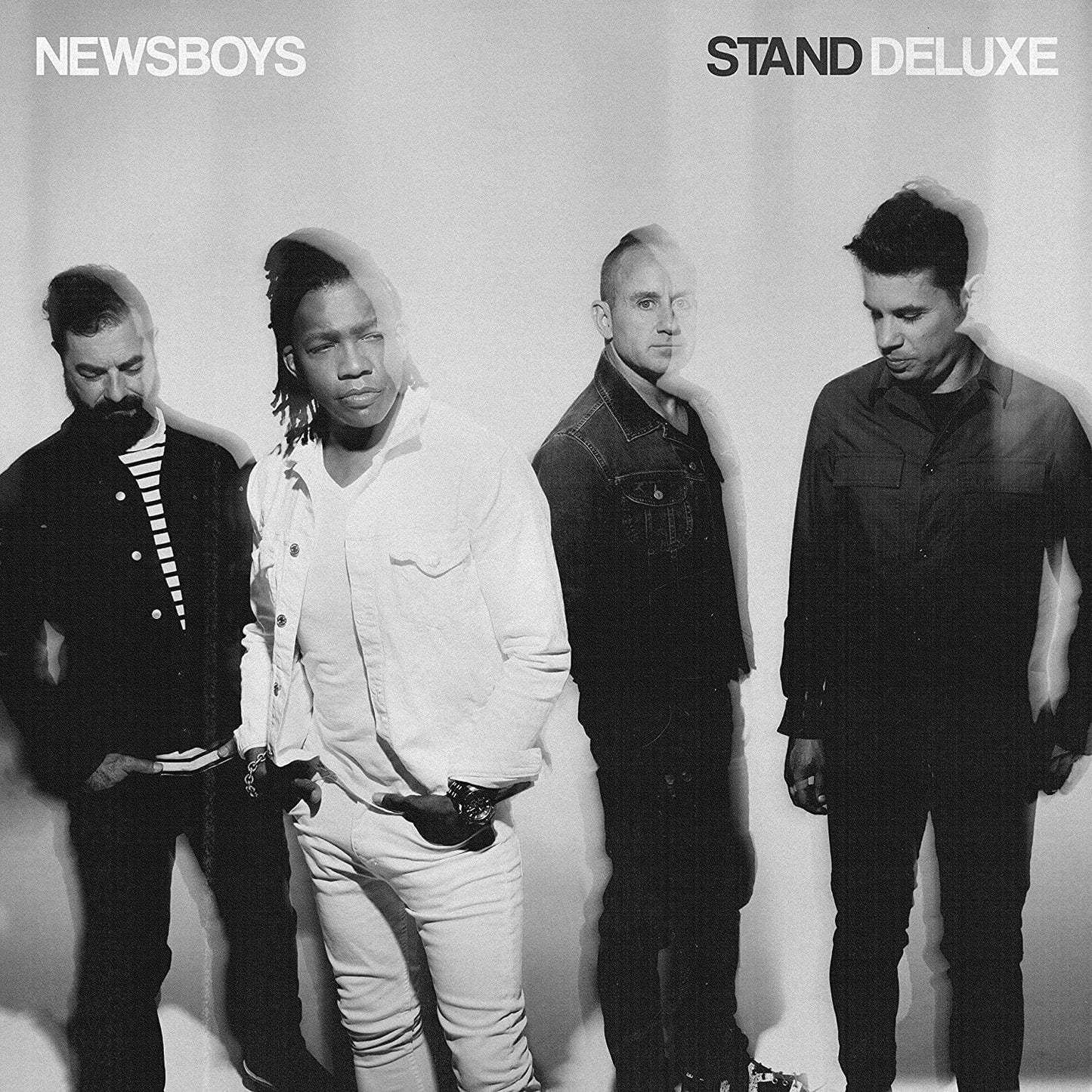 Newsboys "Stand" CD cover: four men in jackets, black and white photo.