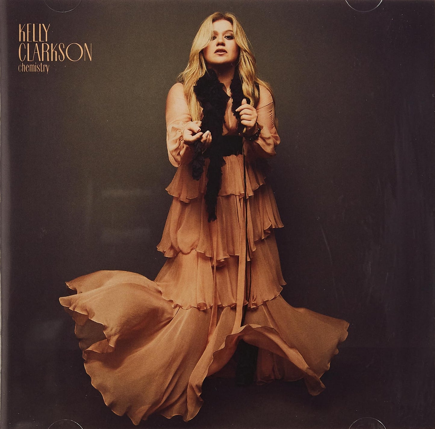 Kelly Clarkson album cover, “chemistry,” featuring a portrait of the singer.