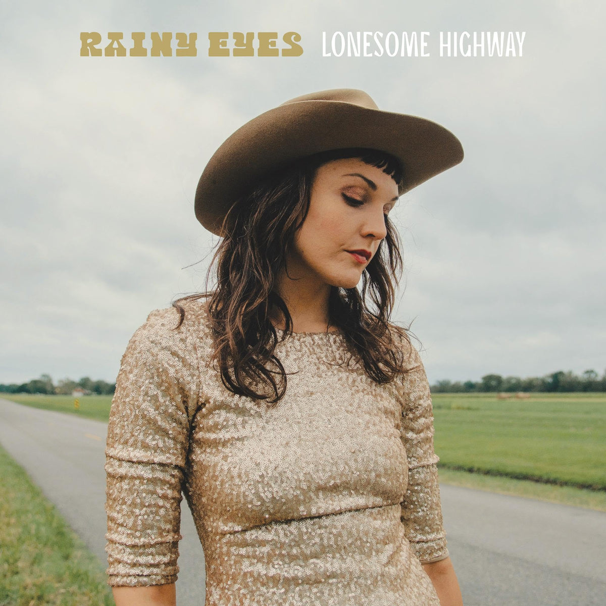 Album cover featuring a woman in a cowboy hat and sequined top.