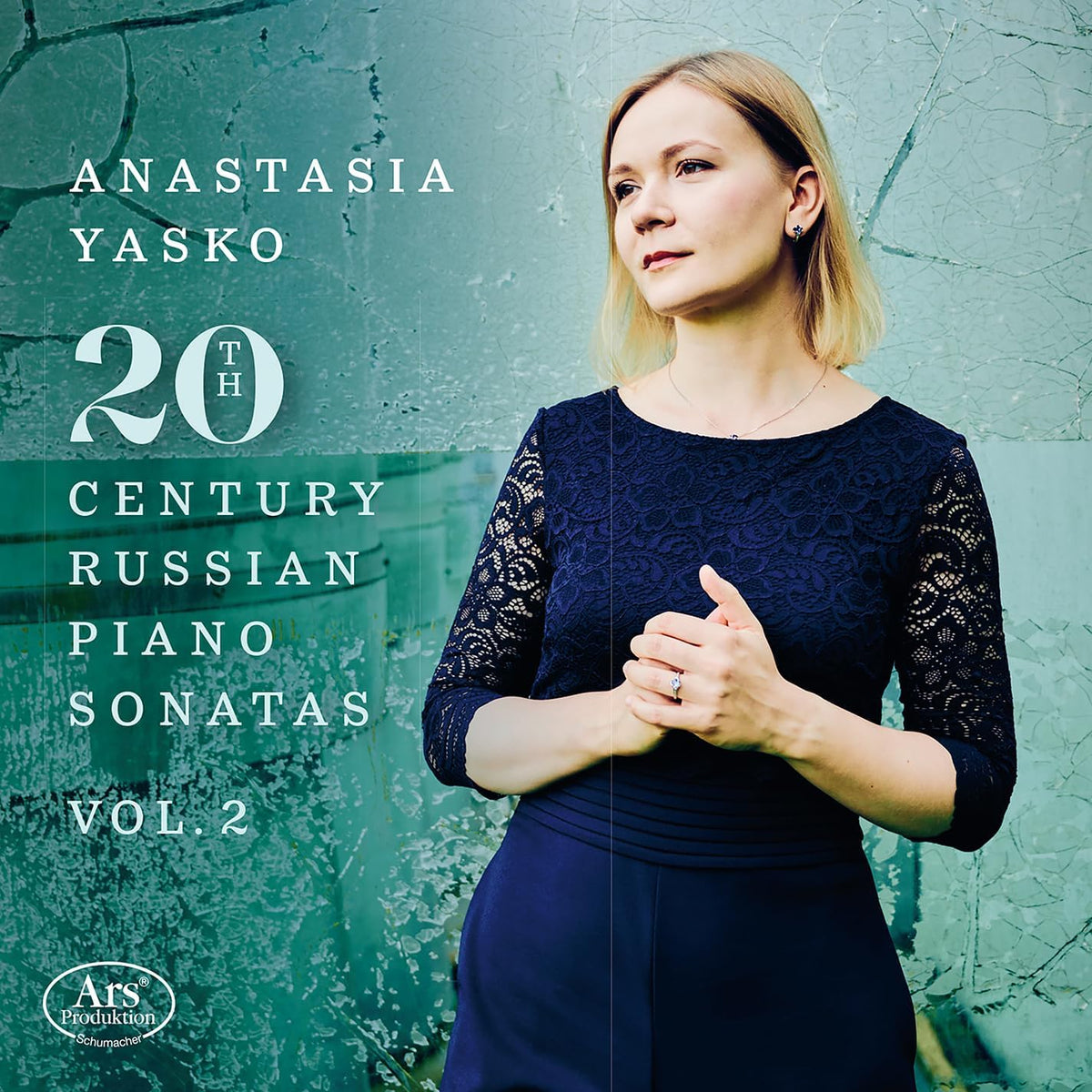 CD cover featuring pianist Anastasia Yasko in a blue lace dress.