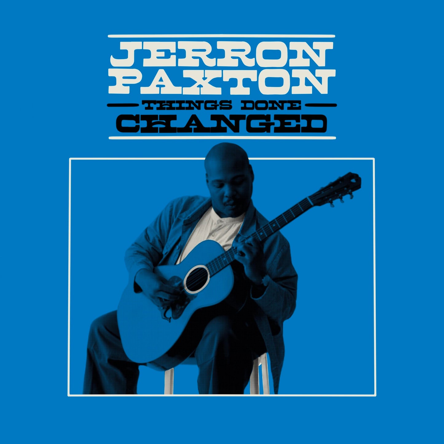 Jerron Paxton album cover: a blues musician playing acoustic guitar.