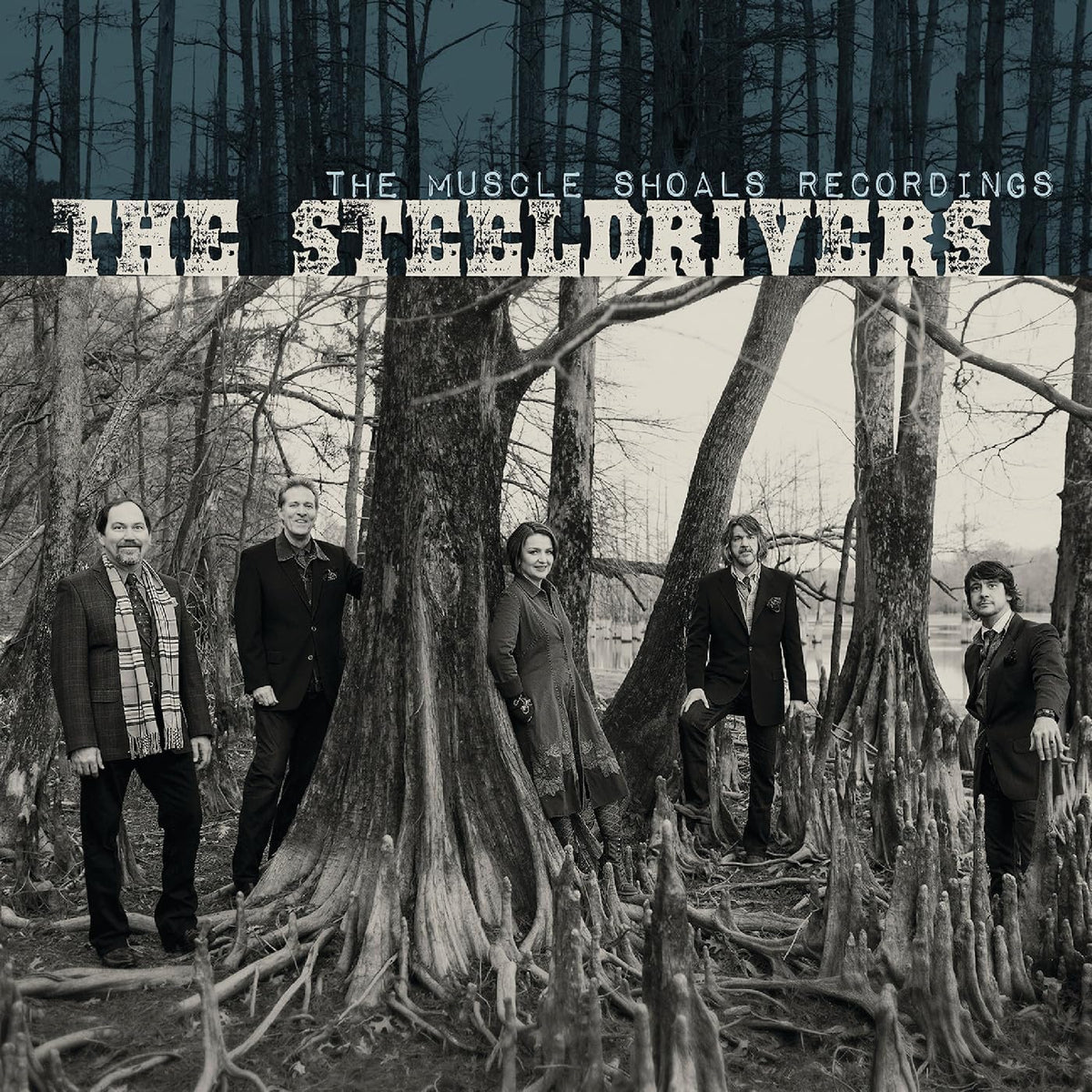 The Steeldrivers band portrait in front of a cypress swamp.