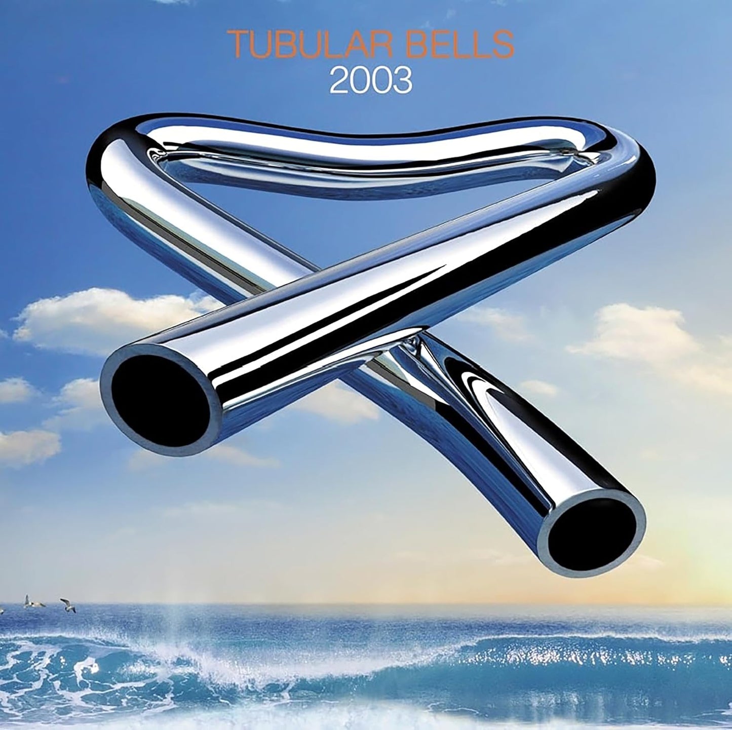 “Tubular Bells 2003” CD cover with chrome tubular bells against a seascape.
