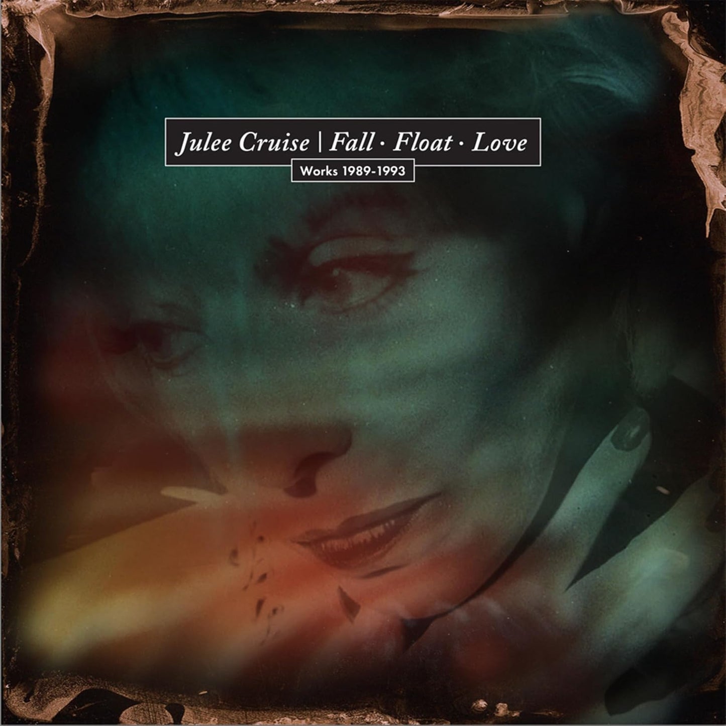Julee Cruise album cover: a blurred, shadowy portrait with text.