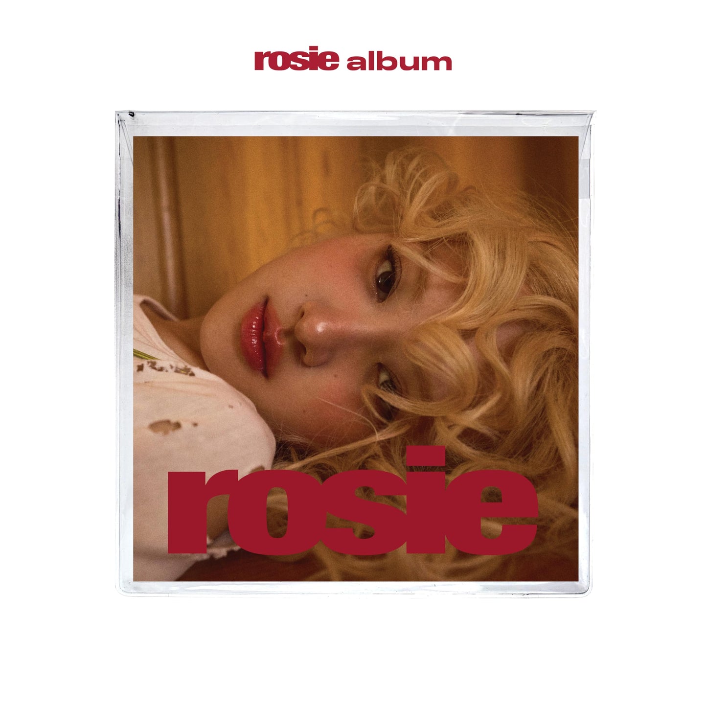 CD cover for “rosie” featuring a blonde woman and red text.