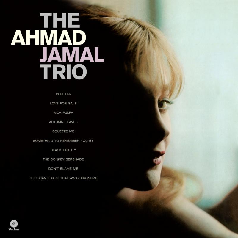 Album cover featuring a woman's profile in shadow and a tracklist on black background.