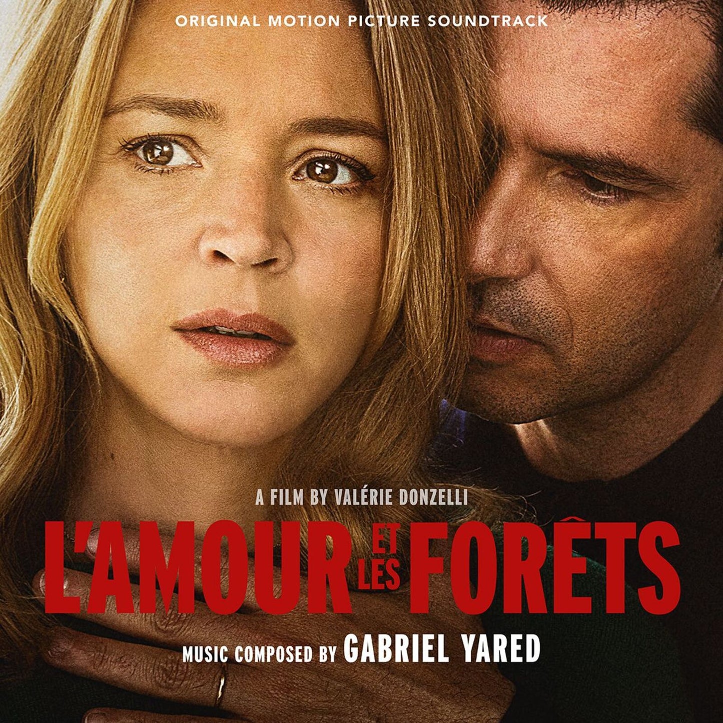 CD cover featuring a close-up of a woman and man looking solemn.