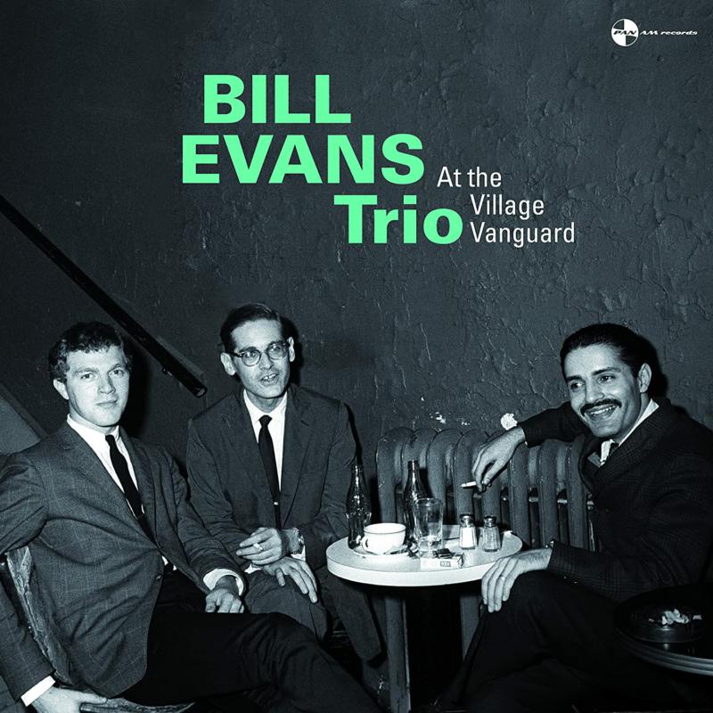 Bill Evans Trio album cover featuring a black and white photo of the musicians.