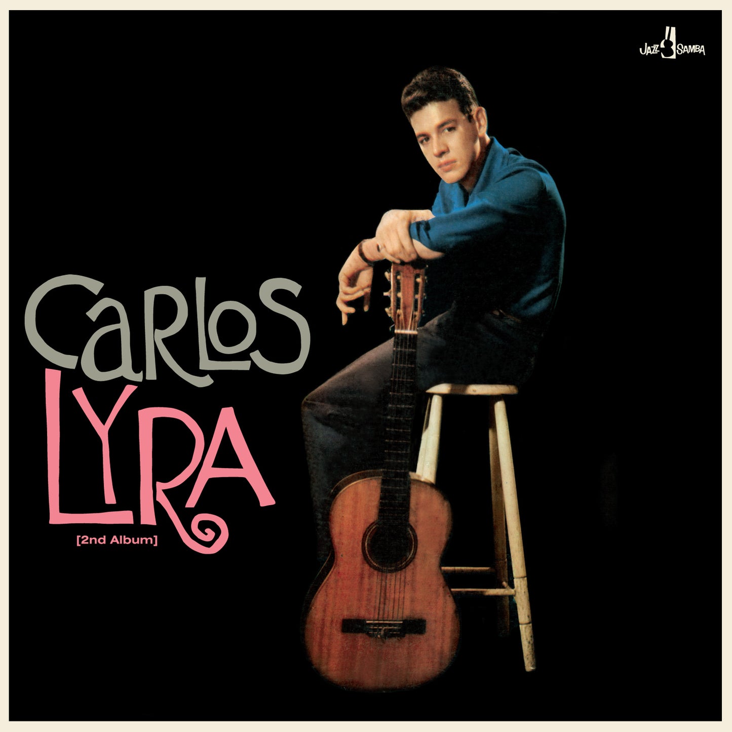 Carlos Lyra’s second album cover featuring him with a guitar.