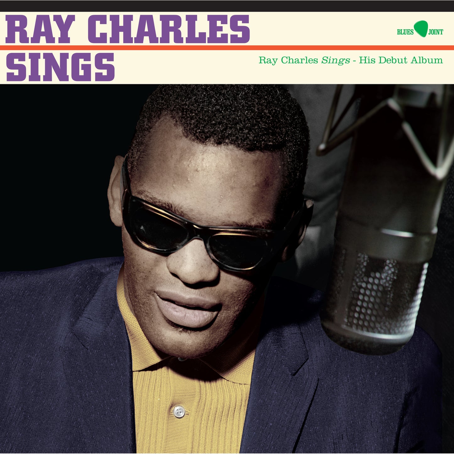Ray Charles in sunglasses, album cover for "Sings" with microphone.