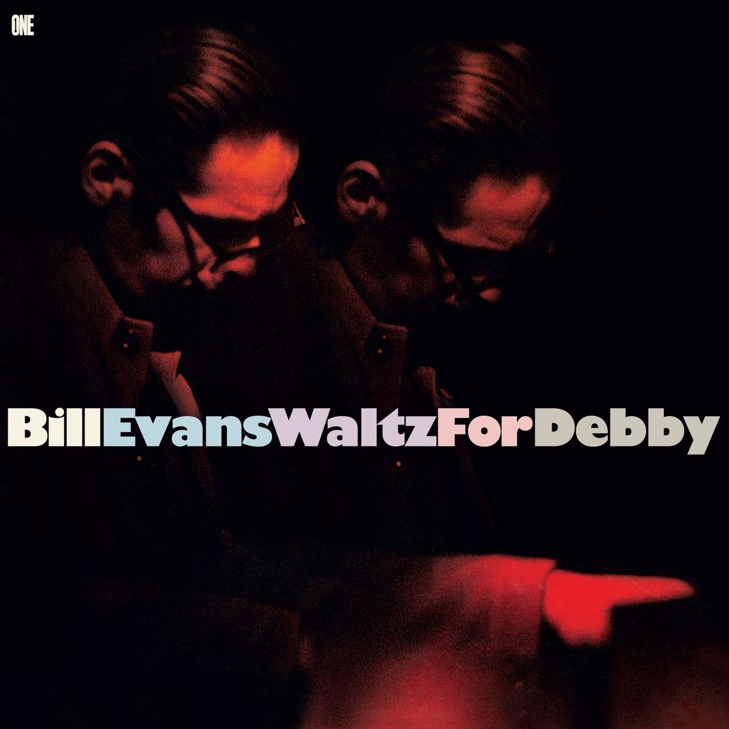 Bill Evans album cover: shadowed portrait and bold white text.