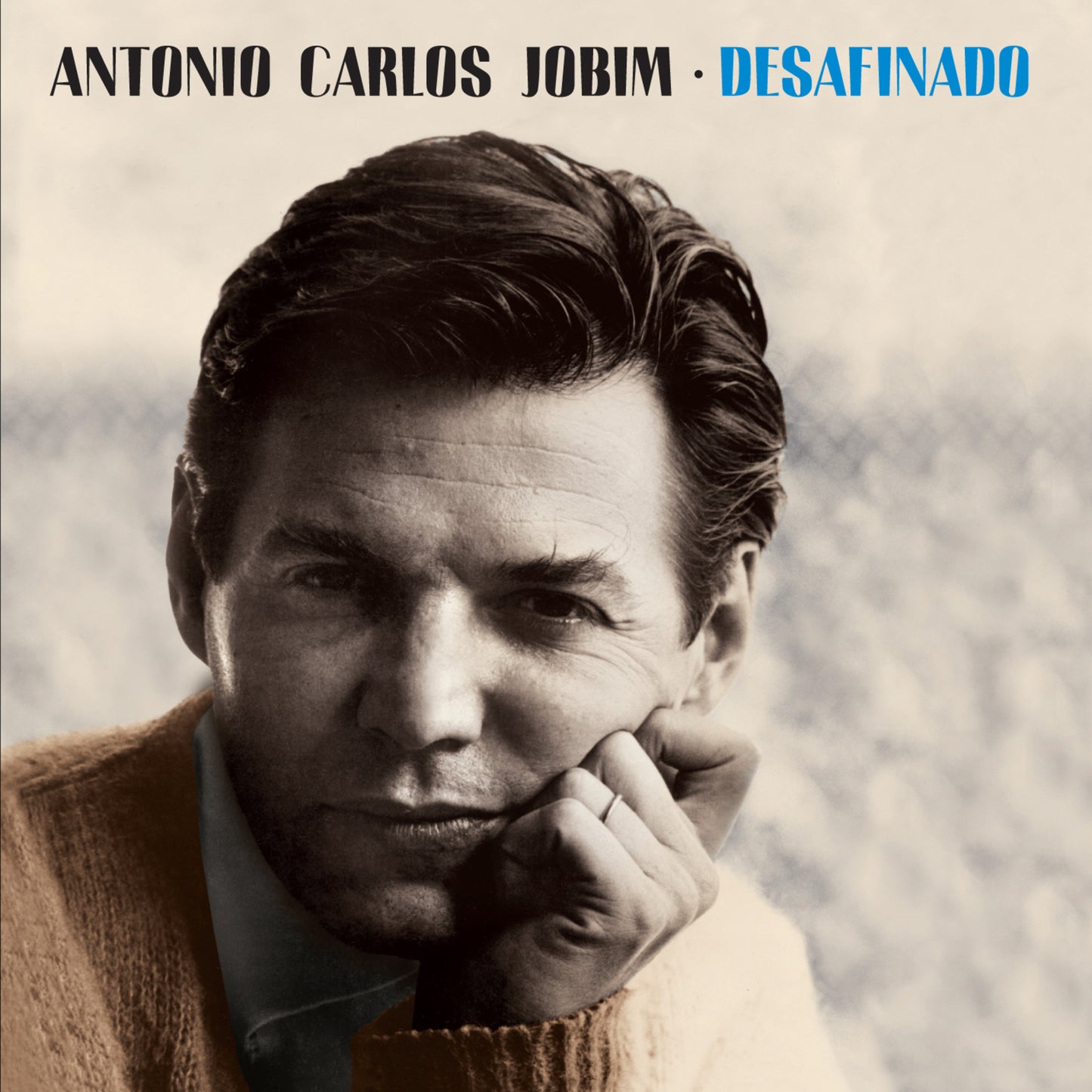Antonio Carlos Jobim album cover, black and white portrait, textured background.