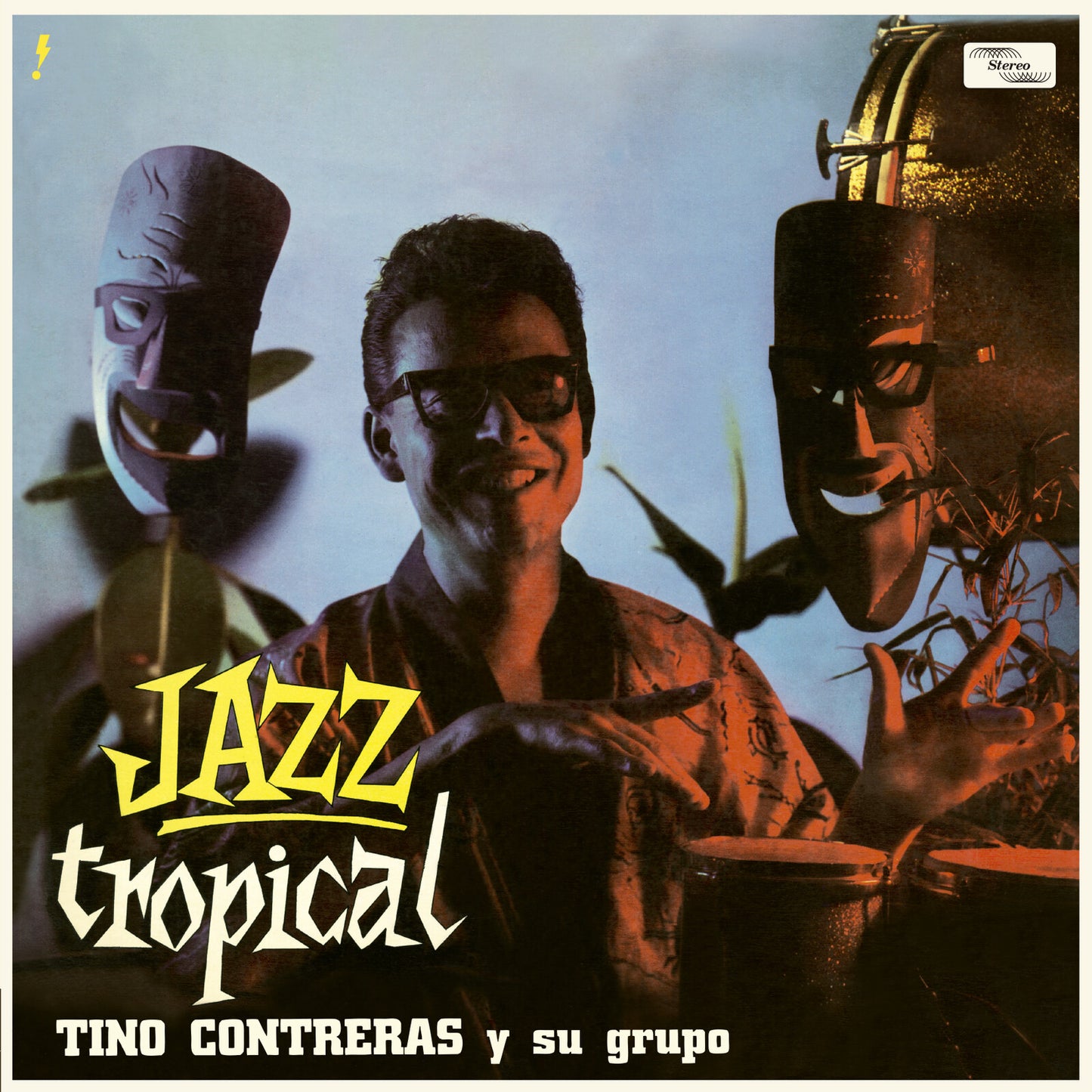 Vinyl record cover featuring Tino Contreras and musicians in a tropical style.