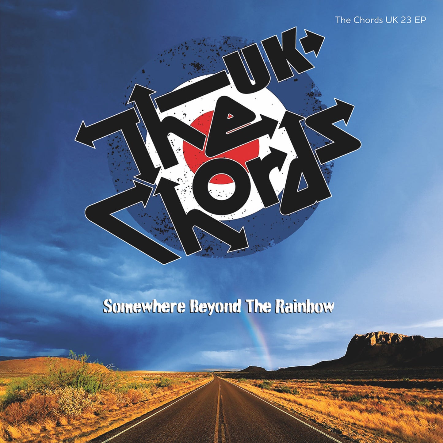 Record cover with band logo, rainbow, desert landscape, and road.