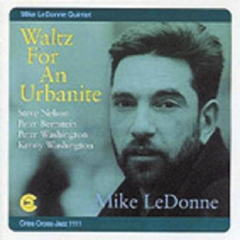 CD cover featuring a portrait of musician Mike LeDonne, teal background.