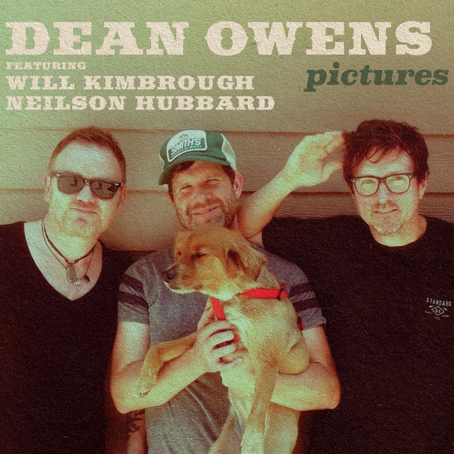 Album cover for "Pictures" by Dean Owens featuring three men and a dog.