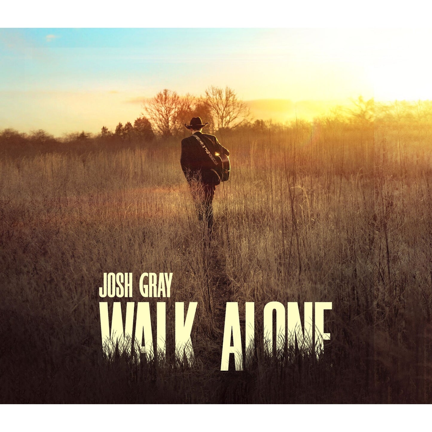 Album cover: man walking into sunset in a field, text "Josh Gray Walk Alone".