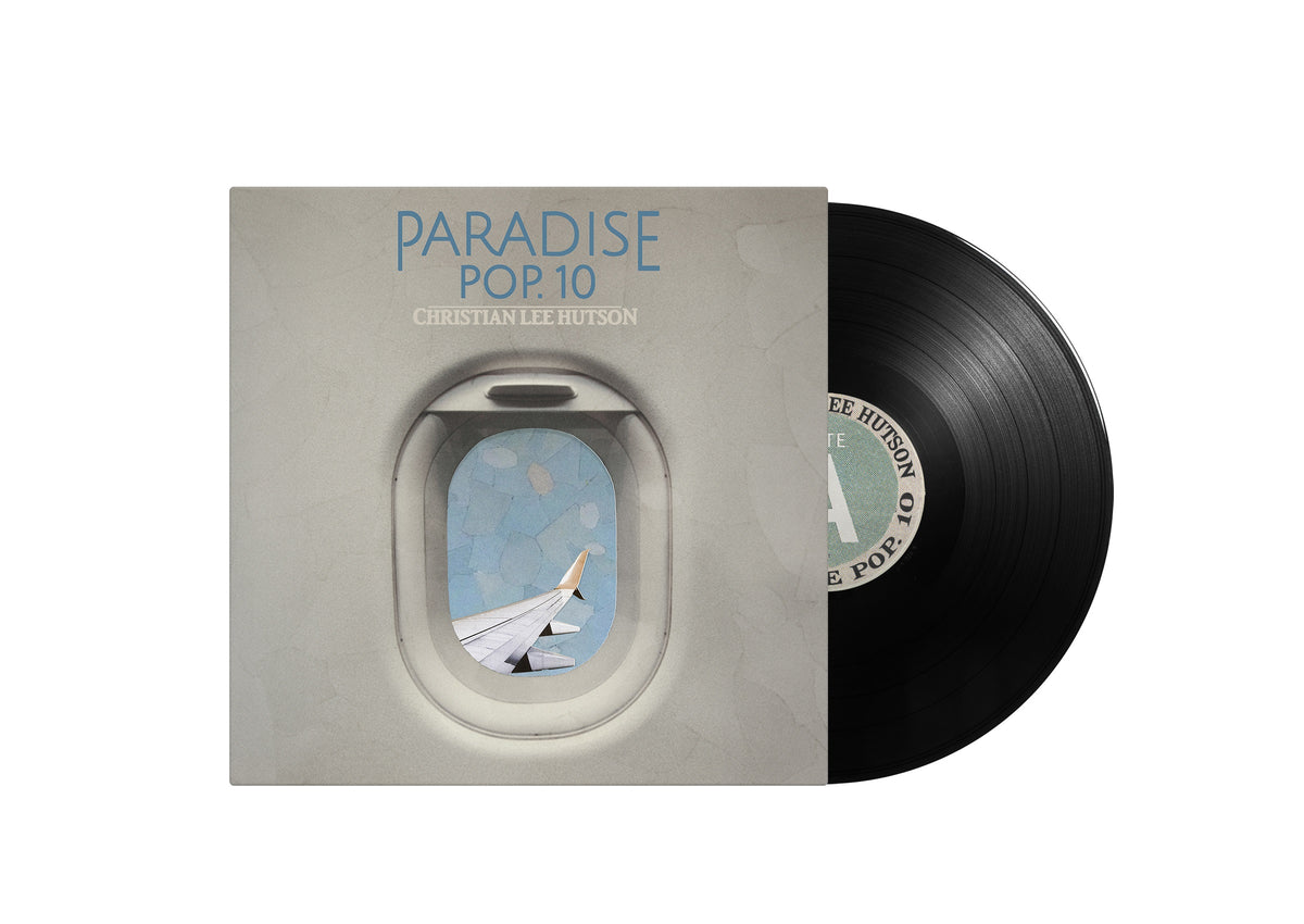 Paradise Pop. 10" vinyl record with airplane window cover art.