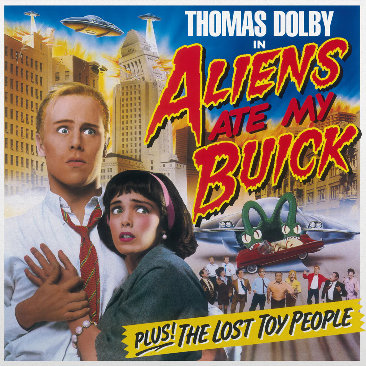 Album cover for "Aliens Ate My Buick" featuring people, aliens, and a car.